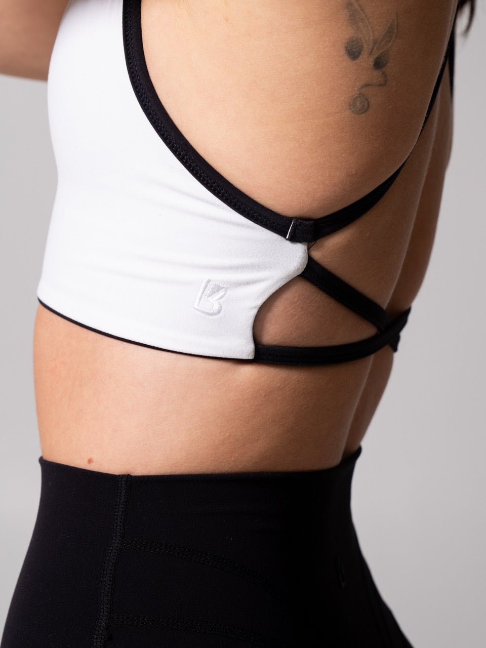 Girlfriend Reversible Sports Bra - Onyx Black and White
