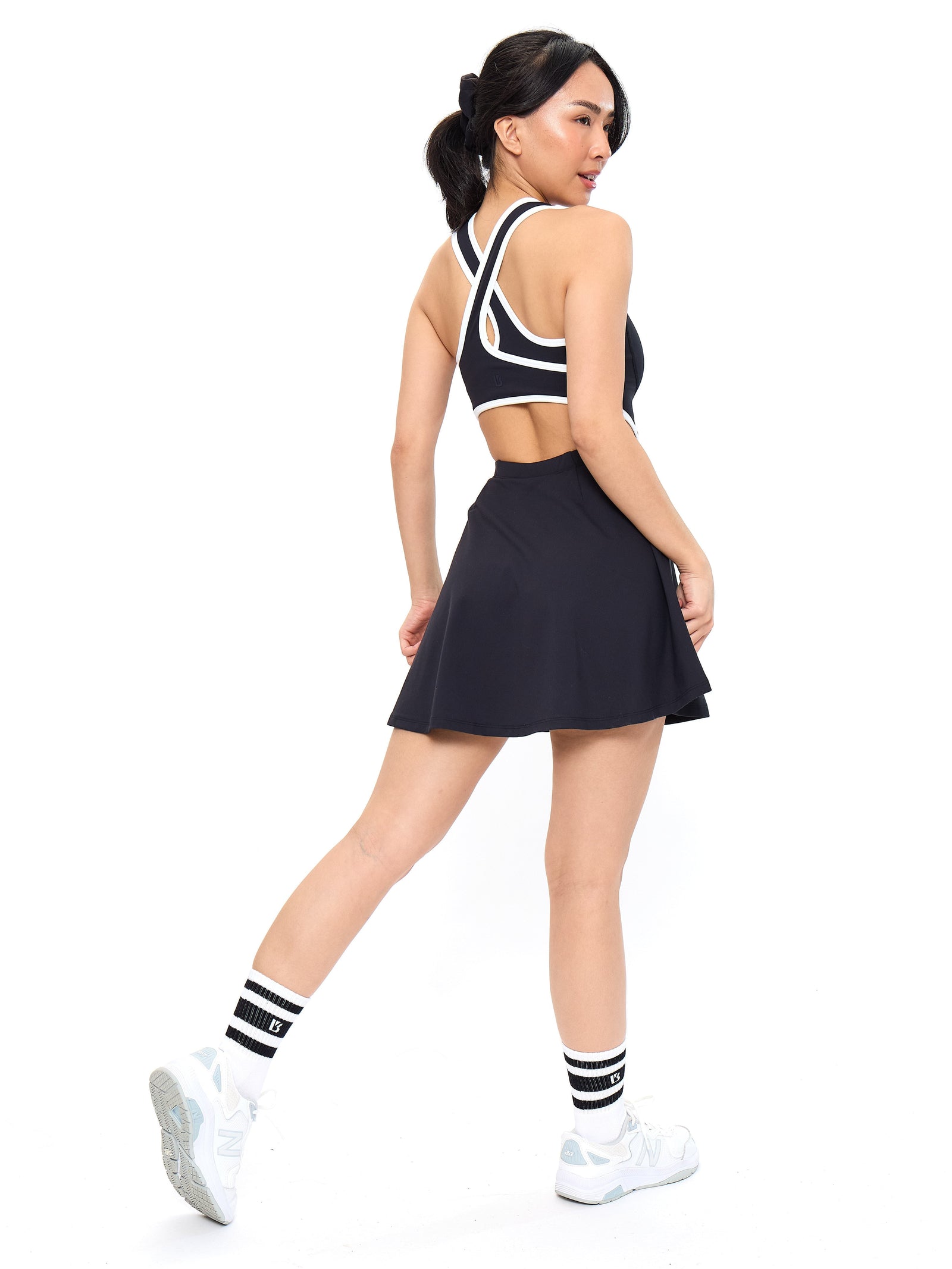 black and white athletic dress One Shot Tennis Fitness Dress Vuori in spandex shorts Black White Lined Active Dress